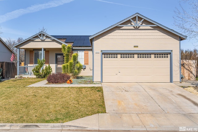 9745 Stone Vista Ct, Reno, NV 89506 - ranch-style home featuring concrete driveway, a porch, solar panels, and an attached garage