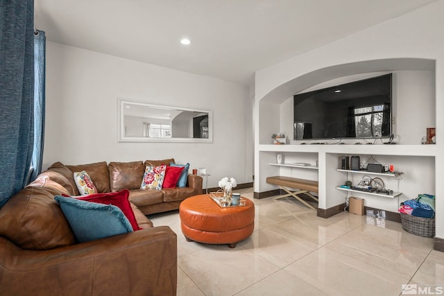 9745 Stone Vista Ct, Reno, NV 89506 - tiled living room with recessed lighting and built in shelves