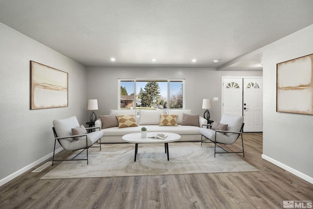 3390 Cashill Blvd, Reno, NV 89509 - living area with baseboards, wood finished floors, and recessed lighting