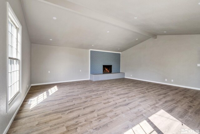 3390 Cashill Blvd, Reno, NV 89509 - unfurnished living room with plenty of natural light, wood finished floors, and baseboards
