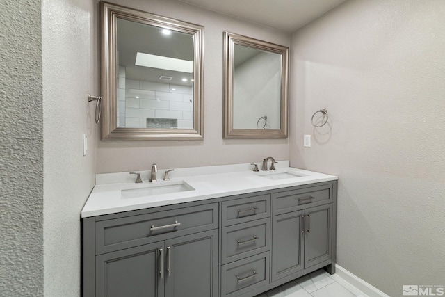 3390 Cashill Blvd, Reno, NV 89509 - bathroom with double vanity and baseboards