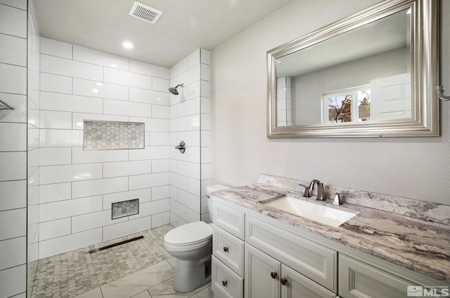 3390 Cashill Blvd, Reno, NV 89509 - full bath with toilet, marble finish floors, tiled shower, and vanity
