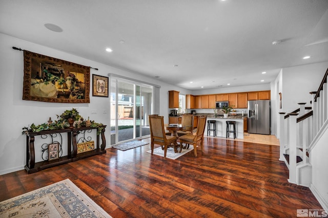 2248 Musselshell Dr, Sparks, NV 89436 - dining space with stairway, wood finished floors, recessed lighting, and baseboards
