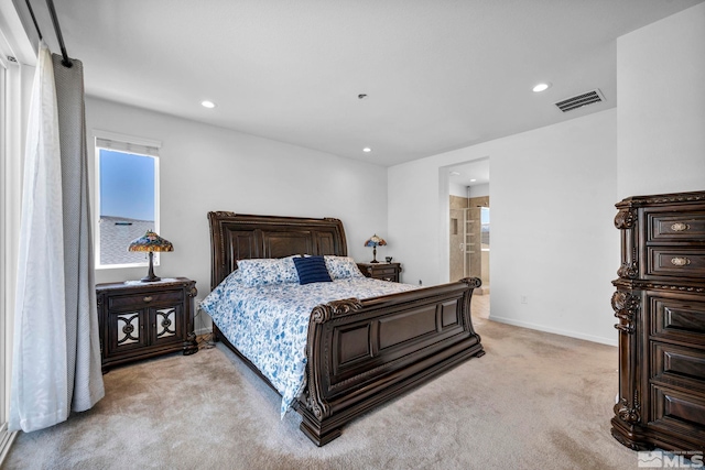 2248 Musselshell Dr, Sparks, NV 89436 - bedroom with light colored carpet, recessed lighting, baseboards, and ensuite bath
