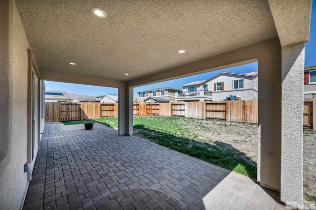 2248 Musselshell Dr, Sparks, NV 89436 - view of patio featuring a fenced backyard and a residential view