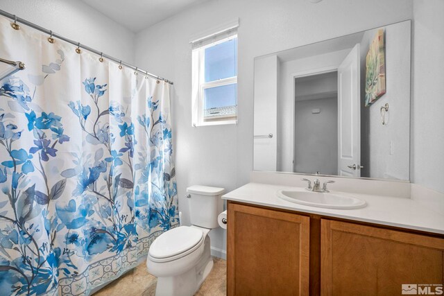 2248 Musselshell Dr, Sparks, NV 89436 - full bath featuring toilet, vanity, and a shower with shower curtain