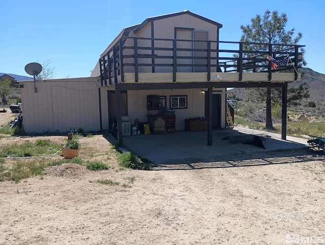 655 Alamosa Dr, Sparks, NV 89441 - back of house featuring a deck and a patio area
