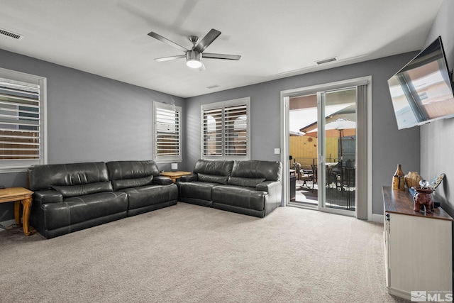 1117 Dapple Dr, Minden, NV 89423 - living area with carpet floors, healthy amount of natural light, and ceiling fan