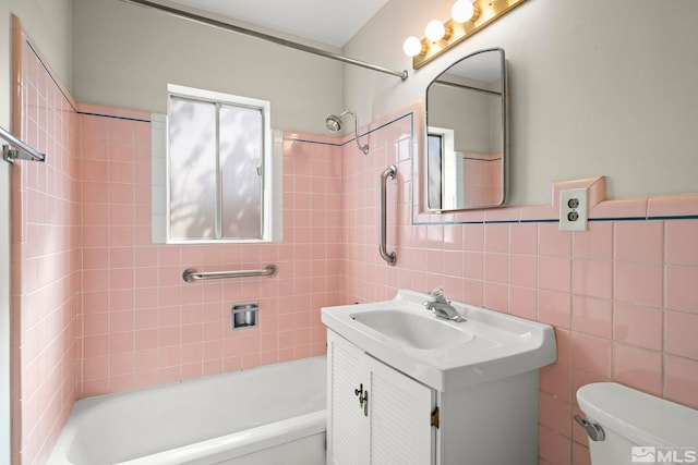 1100 Keystone Ave, Reno, NV 89503 - full bath featuring toilet, shower / bathtub combination, tile walls, and vanity