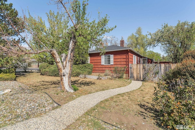 1100 Keystone Ave, Reno, NV 89503 - view of property exterior featuring fence and a chimney