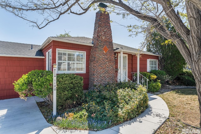1100 Keystone Ave, Reno, NV 89503 - view of front of property featuring a chimney and roof with shingles