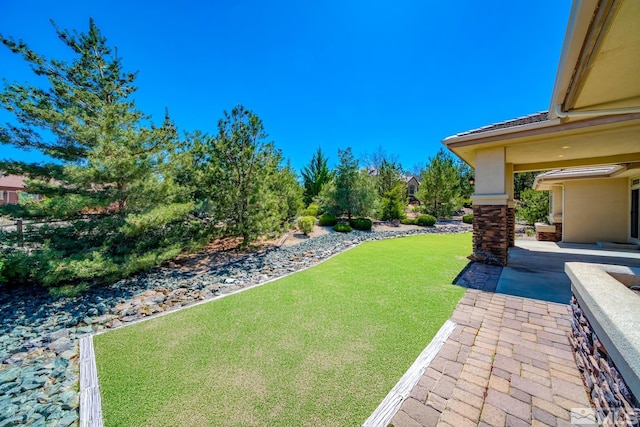 13000 Silver Wolf Rd, Reno, NV 89511 - view of grassy yard featuring a patio
