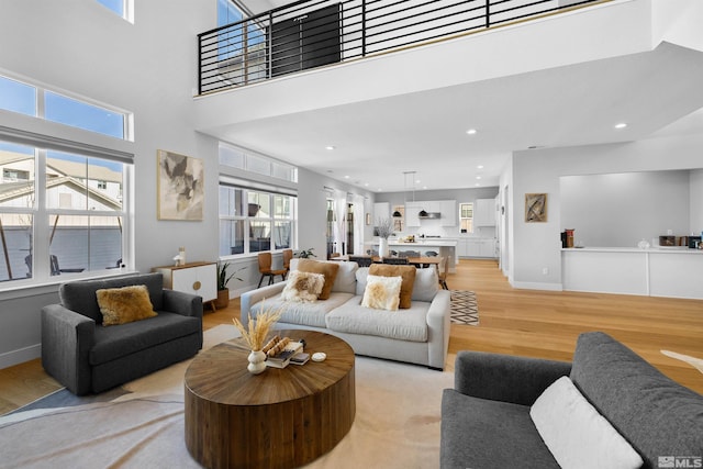 5424 Side Saddle Trl, Reno, NV 89511 - living room featuring light wood-style flooring and recessed lighting