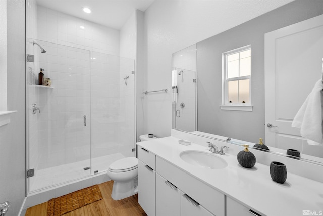 5424 Side Saddle Trl, Reno, NV 89511 - full bath with toilet, a stall shower, vanity, and wood finished floors