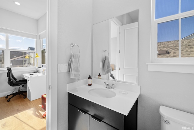 5424 Side Saddle Trl, Reno, NV 89511 - half bath with wood finished floors, toilet, and vanity