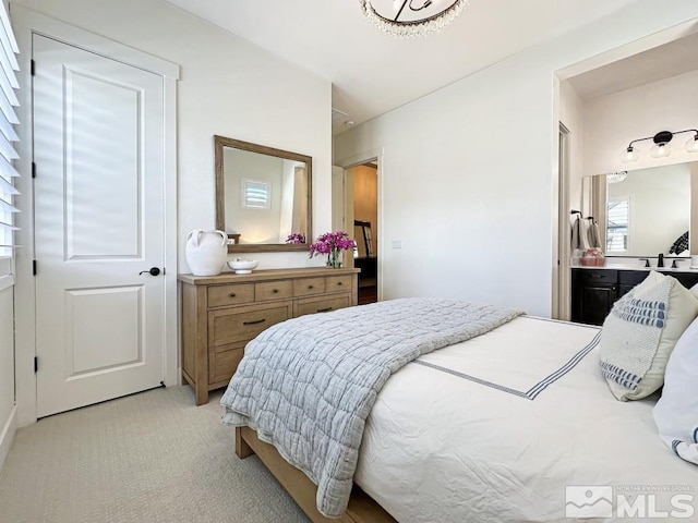 bedroom with light carpet