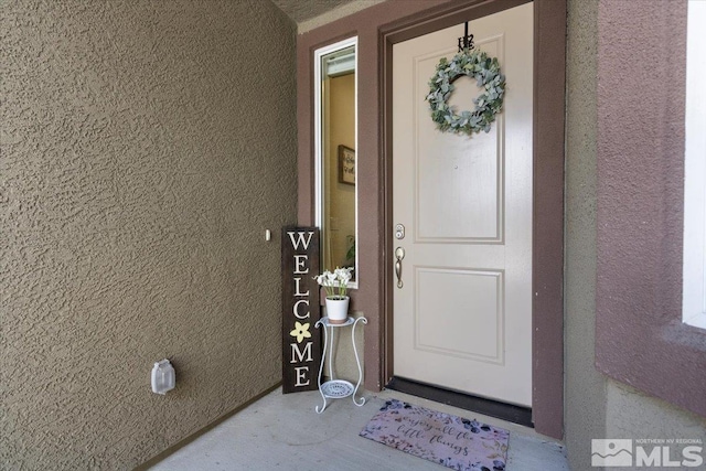 8555 Spearhead Way, Reno, NV 89506 - entrance to property featuring stucco siding