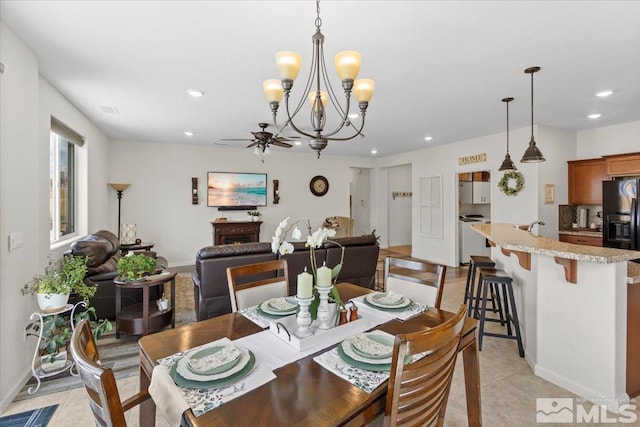 8555 Spearhead Way, Reno, NV 89506 - dining area with recessed lighting, a chandelier, ceiling fan, and baseboards