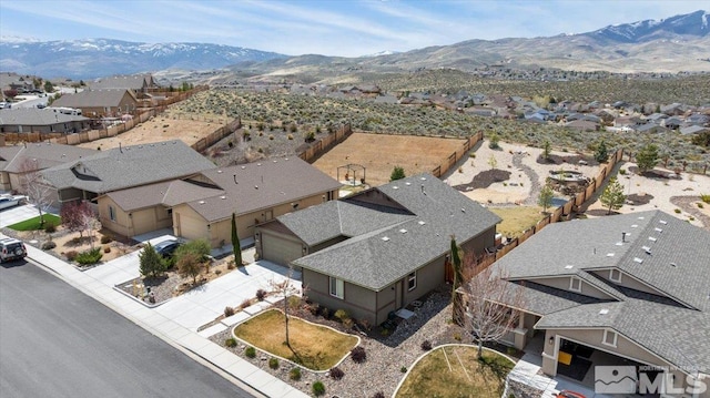 8555 Spearhead Way, Reno, NV 89506 - aerial perspective of suburban area with mountains