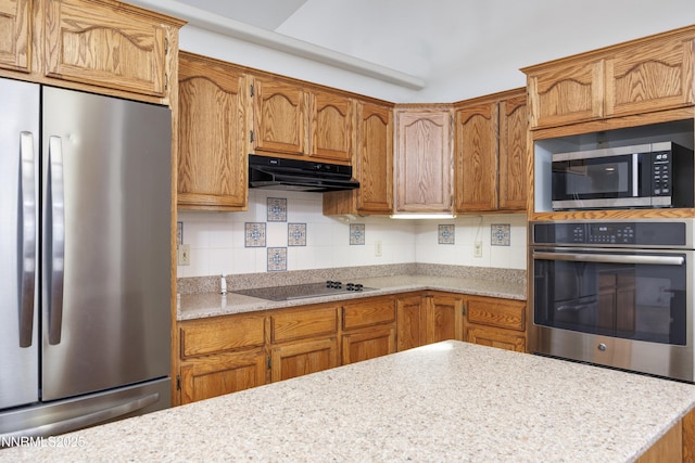 5375 Vinewood Cir, Fallon, NV 89406 - kitchen featuring stainless steel appliances, ventilation hood, light countertops, and brown cabinets