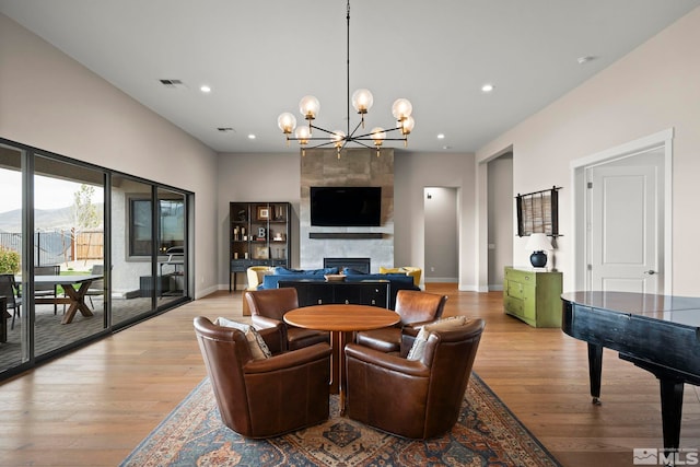 3019 Copper Stone Dr, Reno, NV 89521 - living area featuring a chandelier, light wood-style flooring, recessed lighting, and baseboards