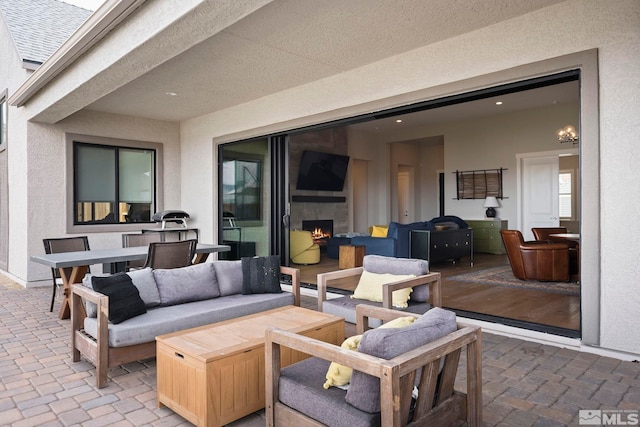 3019 Copper Stone Dr, Reno, NV 89521 - view of patio featuring an outdoor living space with a fireplace