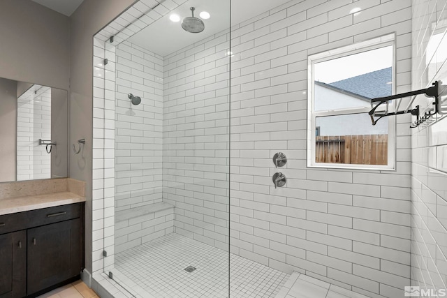 3019 Copper Stone Dr, Reno, NV 89521 - full bath featuring tiled shower, tile patterned flooring, and vanity