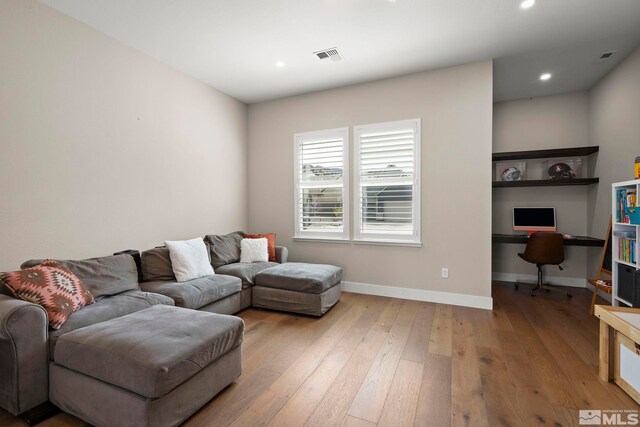 3019 Copper Stone Dr, Reno, NV 89521 - living area featuring hardwood / wood-style floors, a desk, baseboards, and recessed lighting