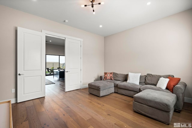 3019 Copper Stone Dr, Reno, NV 89521 - living room featuring wood-type flooring, baseboards, and recessed lighting