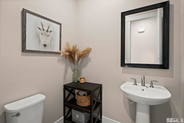 3019 Copper Stone Dr, Reno, NV 89521 - half bathroom with toilet and baseboards