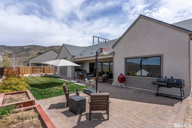 3019 Copper Stone Dr, Reno, NV 89521 - back of property featuring stucco siding and a patio