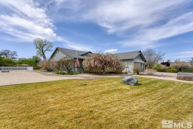 2875 Waegle Way, Fernley, NV 89408 - obstructed view of property with driveway and a garage
