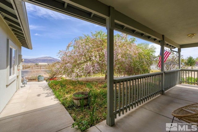 2875 Waegle Way, Fernley, NV 89408 - view of patio / terrace with a mountain view