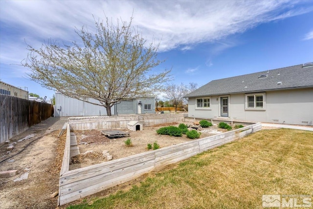 2875 Waegle Way, Fernley, NV 89408 - view of yard featuring a vegetable garden
