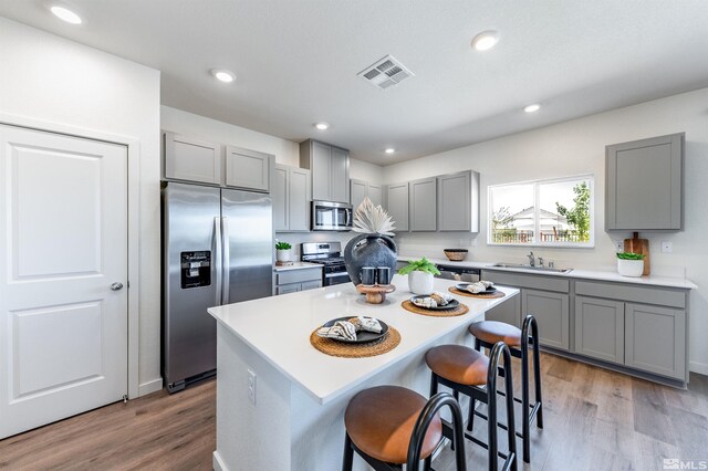 7605 Apex Pl Lot # 112, Reno, NV 89506 - kitchen with stainless steel appliances, gray cabinets, and recessed lighting