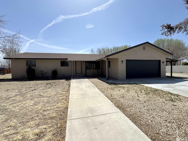 3003 Alcorn Rd, Fallon, NV 89406 - ranch-style house with driveway, an attached garage, stucco siding, and fence