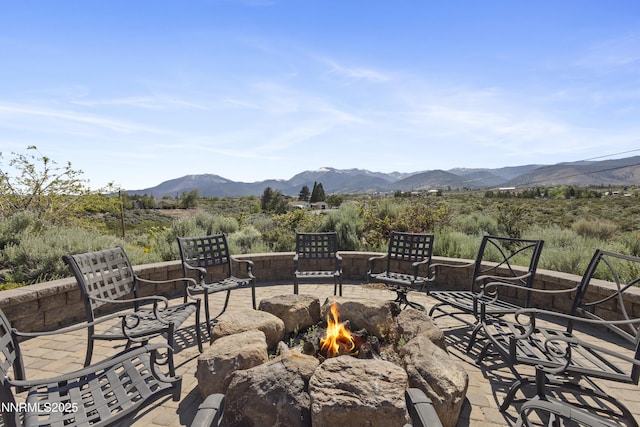 15900 Curtis Ln, Reno, NV 89511 - view of patio with a fire pit and a mountain view
