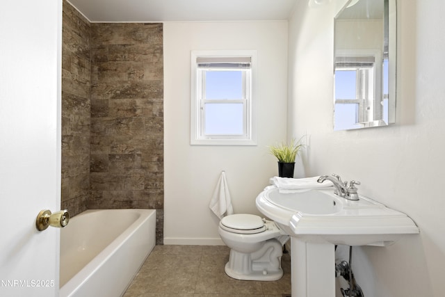 15900 Curtis Ln, Reno, NV 89511 - full bathroom with tile patterned floors, toilet, baseboards, and washtub / shower combination