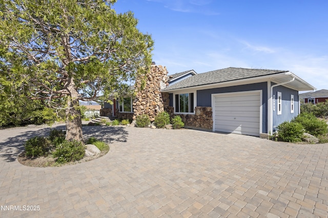 15900 Curtis Ln, Reno, NV 89511 - view of front of house with curved driveway, an attached garage, a chimney, and roof with shingles