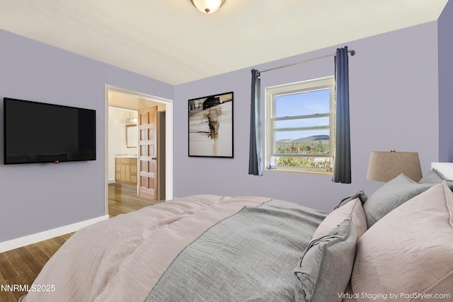 15900 Curtis Ln, Reno, NV 89511 - bedroom featuring wood finished floors, baseboards, and ensuite bath