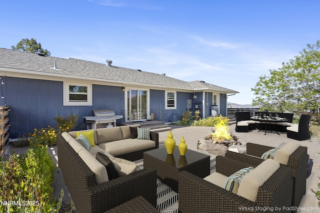 15900 Curtis Ln, Reno, NV 89511 - view of patio with an outdoor living space with a fire pit and grilling area