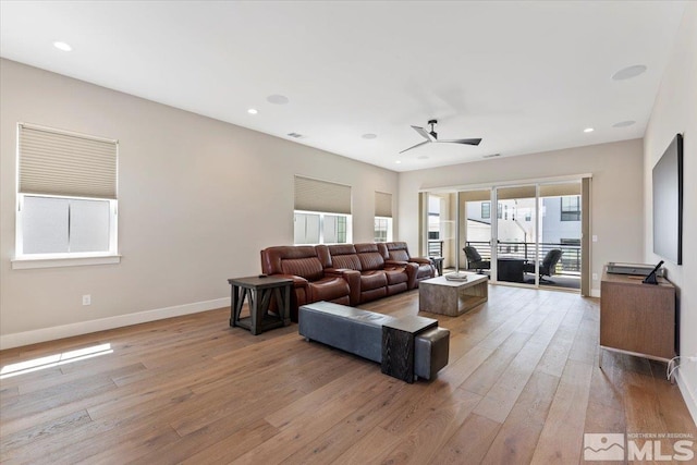 6103 S Pleasant Oak Trl, Reno, NV 89511 - living area featuring light wood-type flooring, a ceiling fan, baseboards, and recessed lighting
