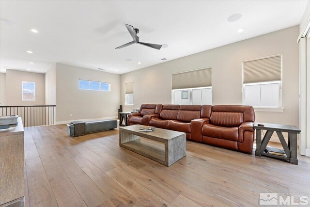 6103 S Pleasant Oak Trl, Reno, NV 89511 - living room featuring light wood-style flooring, a ceiling fan, and recessed lighting