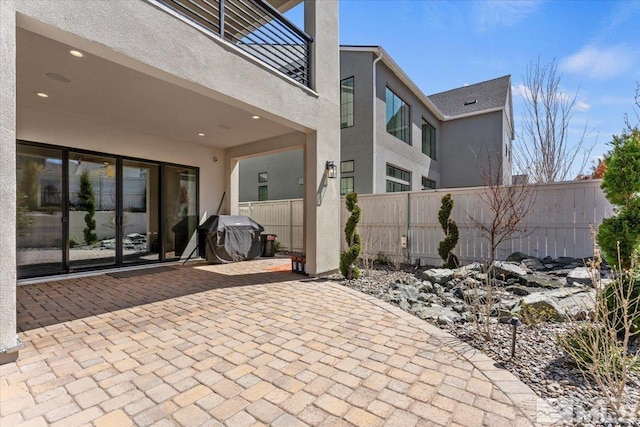 6103 S Pleasant Oak Trl, Reno, NV 89511 - view of patio with fence and a grill