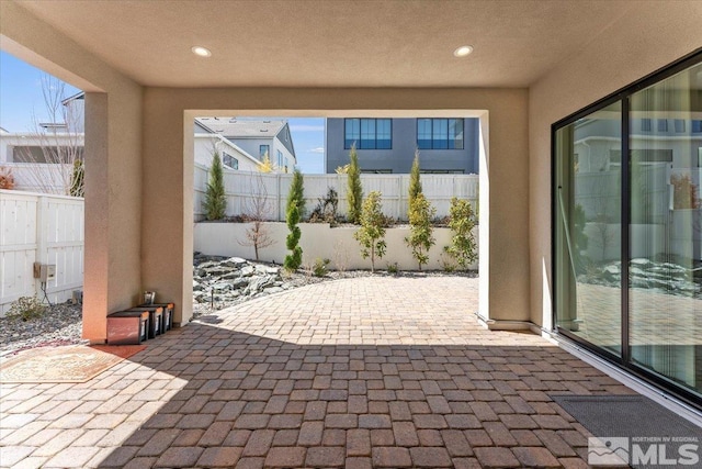 6103 S Pleasant Oak Trl, Reno, NV 89511 - view of patio with a fenced backyard
