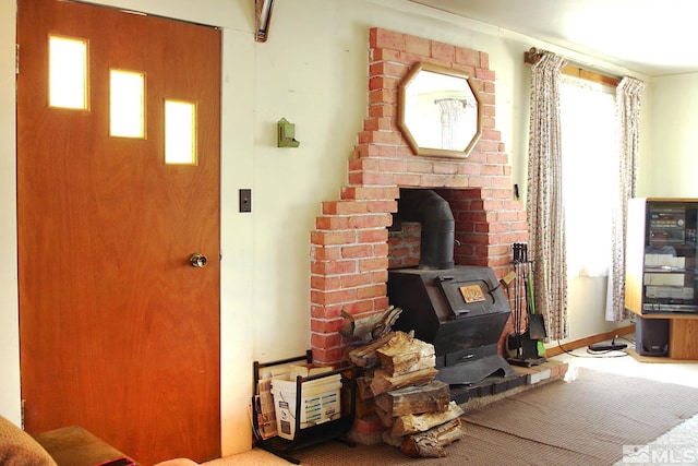 608 A St, Mina, NV 89422 - carpeted living area with a wood stove