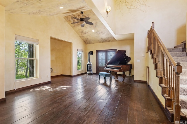4775 Mount Rose Hwy, Reno, NV 89511 - sitting room with high vaulted ceiling, hardwood / wood-style flooring, stairs, a ceiling fan, and baseboards