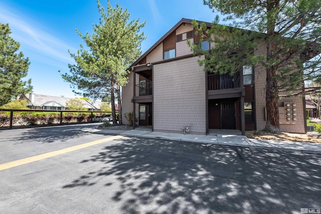 1465 E Peckham Ln Apt 20, Reno, NV 89502 - view of front of house with a balcony