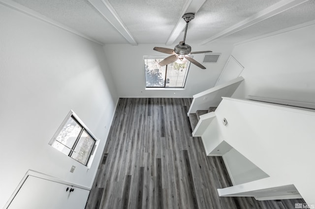 1465 E Peckham Ln Apt 20, Reno, NV 89502 - bonus room featuring a textured ceiling, wood finished floors, beam ceiling, a ceiling fan, and stairway