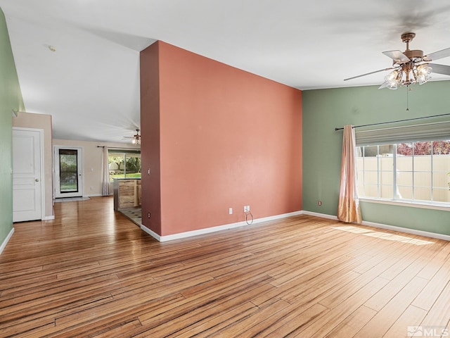 1343 White Bluffs Cir, Fernley, NV 89408 - unfurnished room featuring a ceiling fan, wood finished floors, and baseboards